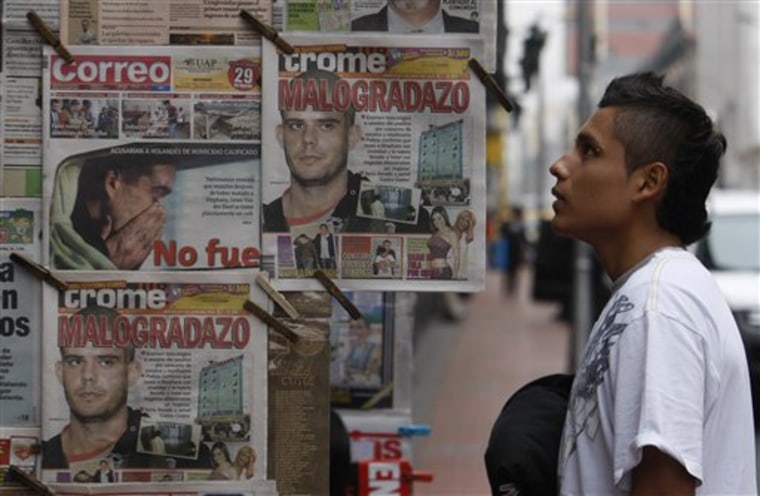 A newspaper stand displays papers bearing images of Joran van der Sloot in Lima, Peru, on Wednesday. 